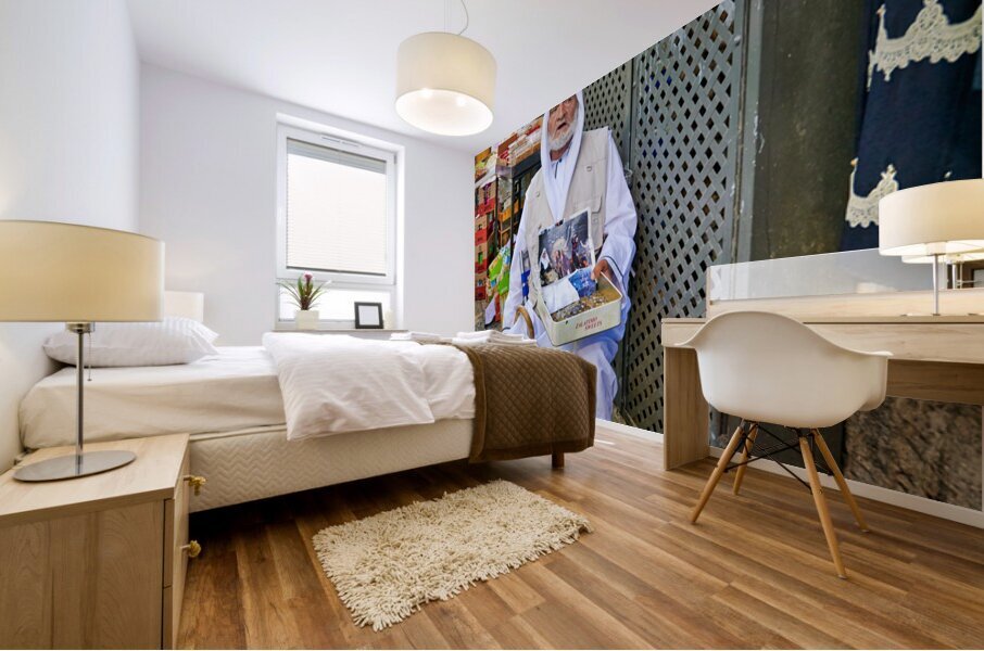 Beggar in the old city of Jerusalem seeks help from passersby Mural print