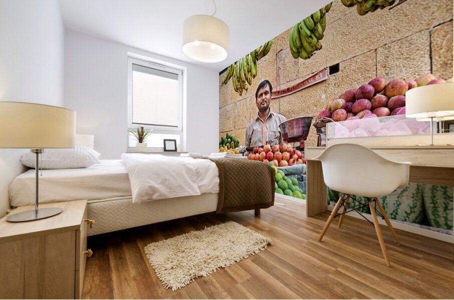 Fruits and vegetables stall in Jaisalmer with vendor at work Mural print