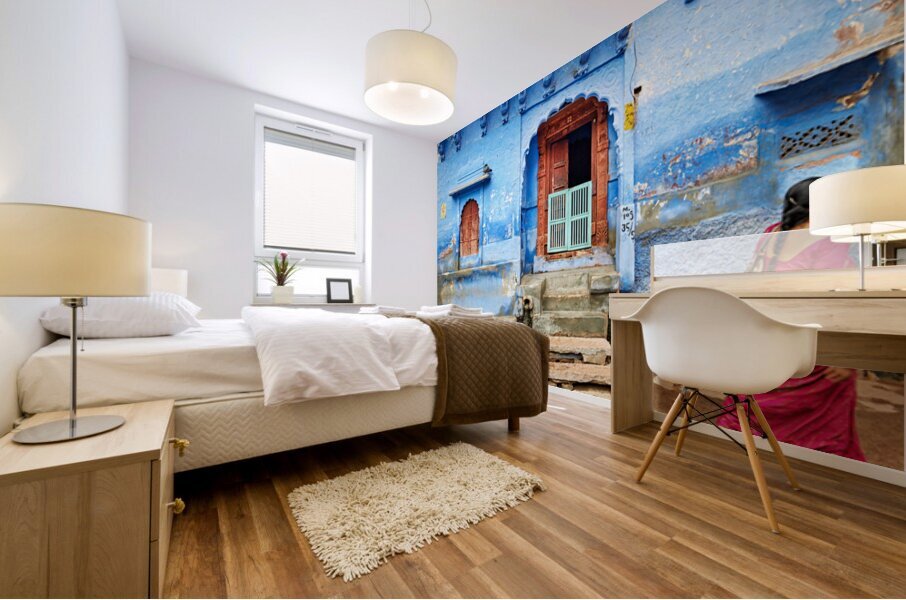 Walking along the blue streets of Jodhpur in Rajasthan India Mural print