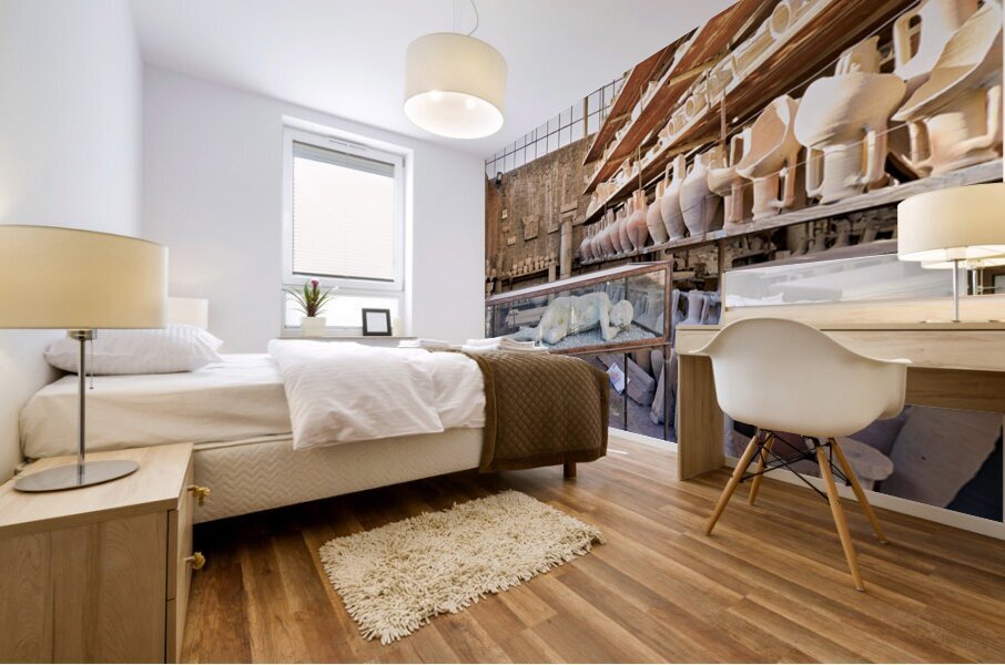 Pompeii site showing artifacts and a plaster cast of a victim Mural print