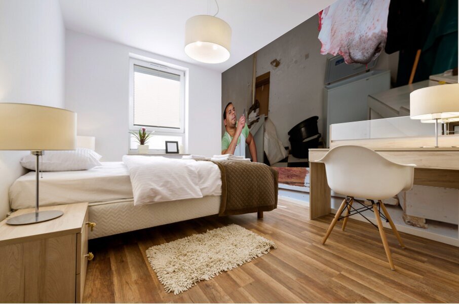 Butcher at work in Meknes souk showing fresh meat and livestock Mural print