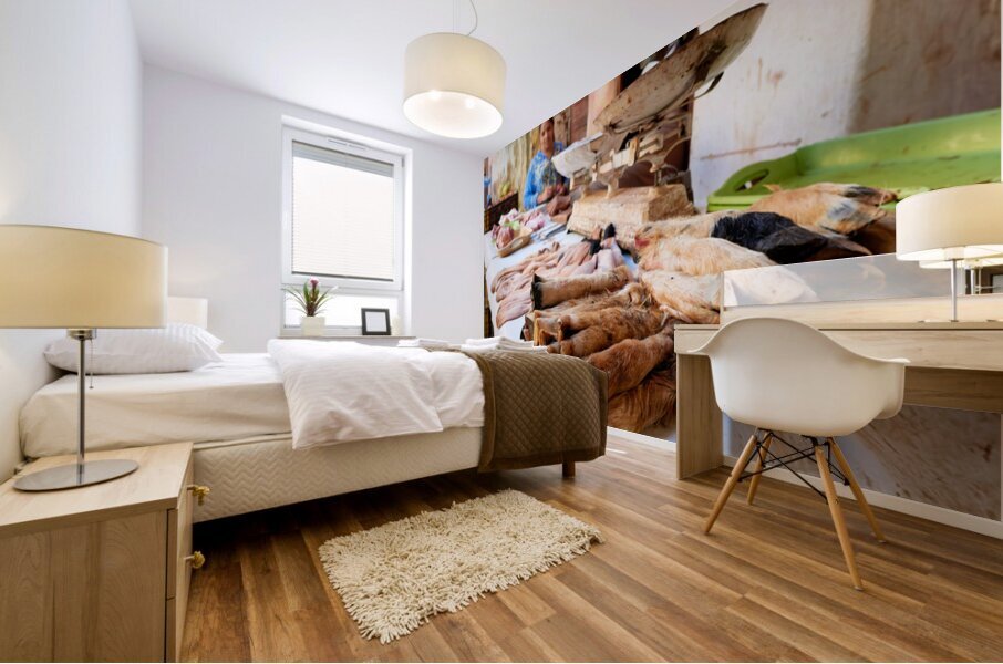 Butcher working in Meknes souk with various cuts of meat Mural print