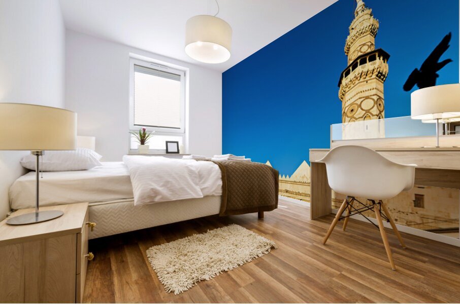 Mosque tower in Damascus against clear blue sky Mural print