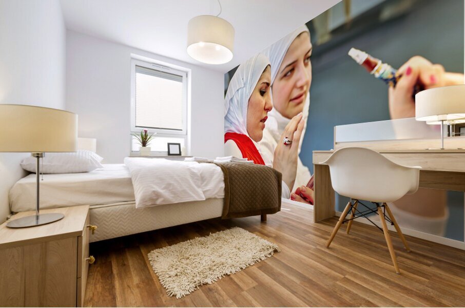 Young women enjoy hookah and talk on mobile phone in Aleppo Syri Mural print