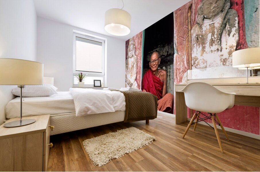 Old monk meditates in temple doorway in Myanmar Mural print