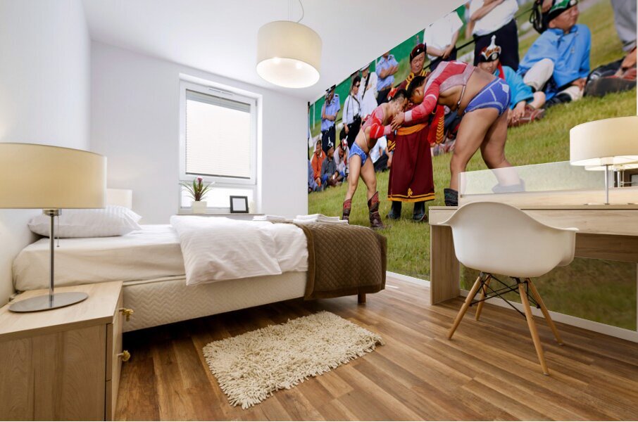 Wrestling matches take place during Naadam festival in Ulaanbaat Mural print