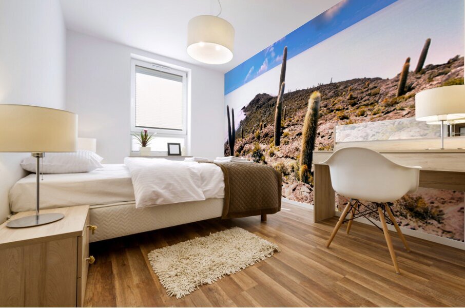 Cactus island in a vast white salt flat under blue sky. Mural print