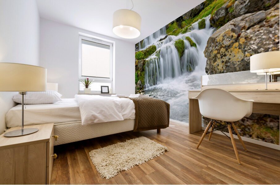 Gongumannafoss waterfall in Iceland with flowing water Mural print