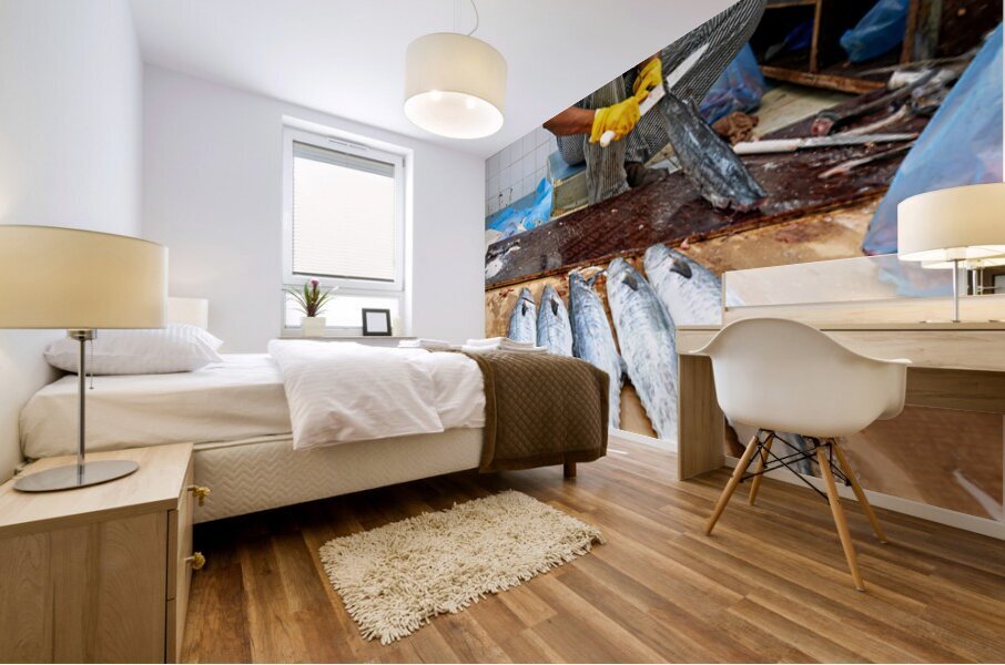 Fish seller prepares catch at Nizwa Oman fish market Mural print