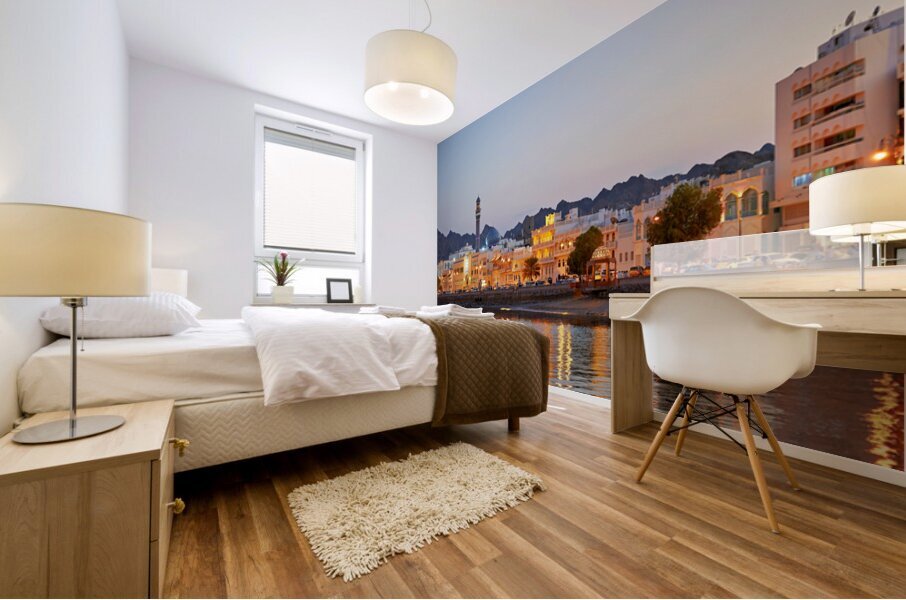 Sunset view of waterfront in Muscat Oman with city lights Mural print