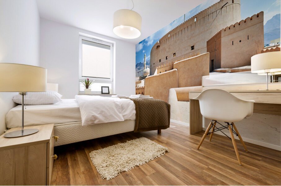 Visitors explore Nizwa Fort a historic site in Oman Mural print