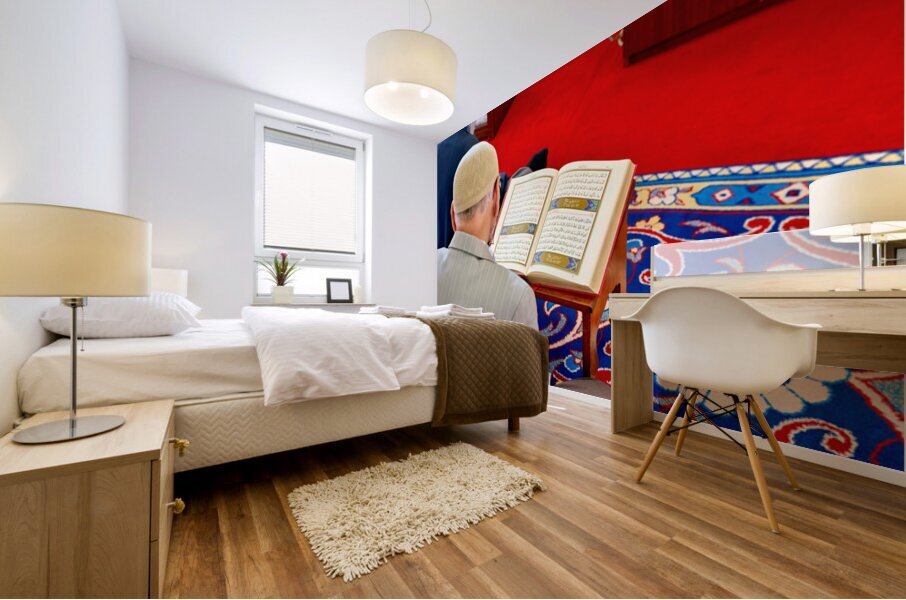 Man reading Quran inside Fatih Mosque in Istanbul Turkey Mural print