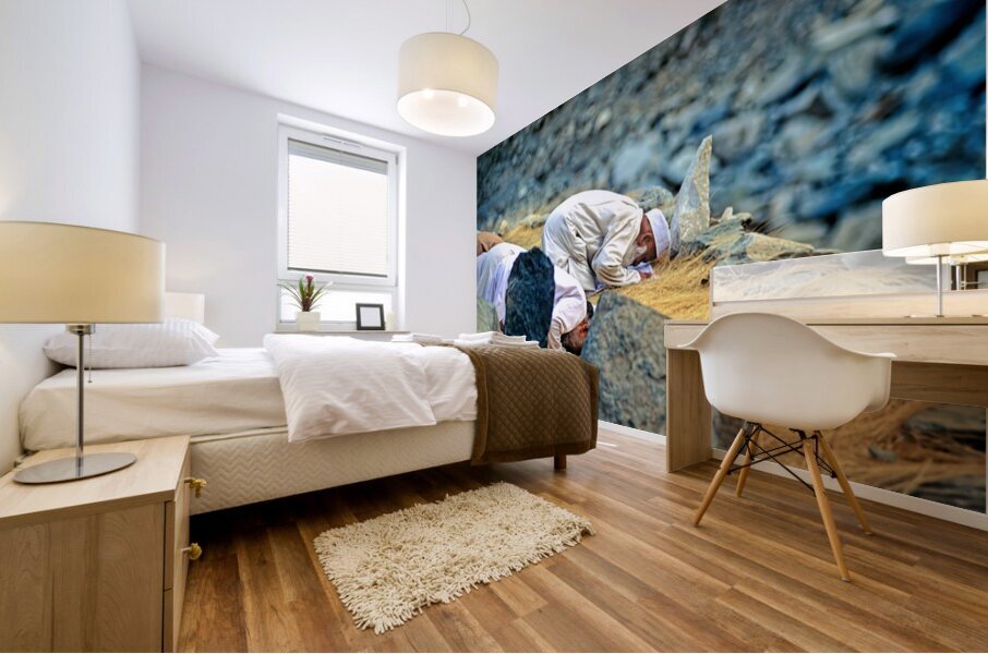 Muslim men pray towards Mecca in Pakistan during prayer time Mural print