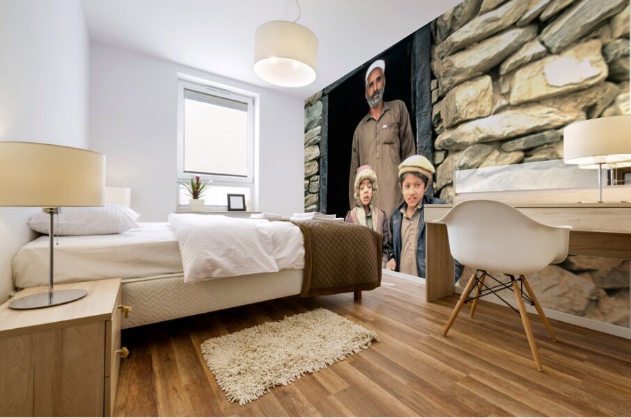 Family near shop at Shandur Pass in Pakistan Mural print