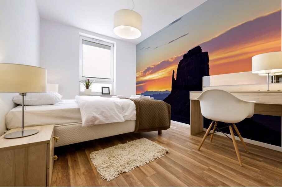 Sunset view over Monument Valley in Utah with dark silhouettes Mural print