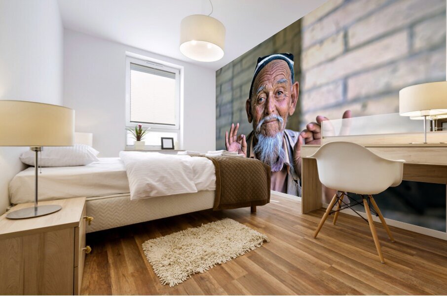 Elderly man showing hand gestures in Khiva Uzbekistan Mural print