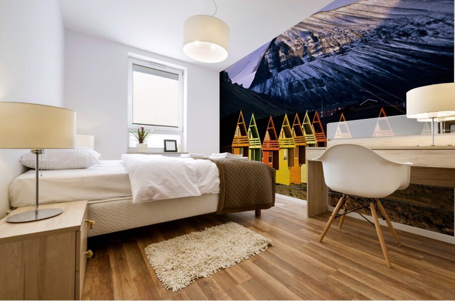 Colorful cabins in Longyearbyen Svalbard near snowy mountains Mural print