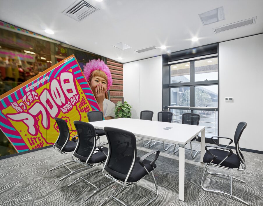 Lolita girl holds sign in Shibuya District of Tokyo during Afro  – Wall Mural 3