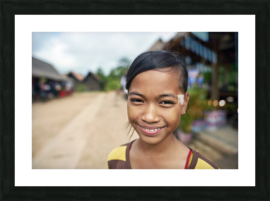 Portrait of a smiling girl in Siem Reap. Cambodia Picture Frame print