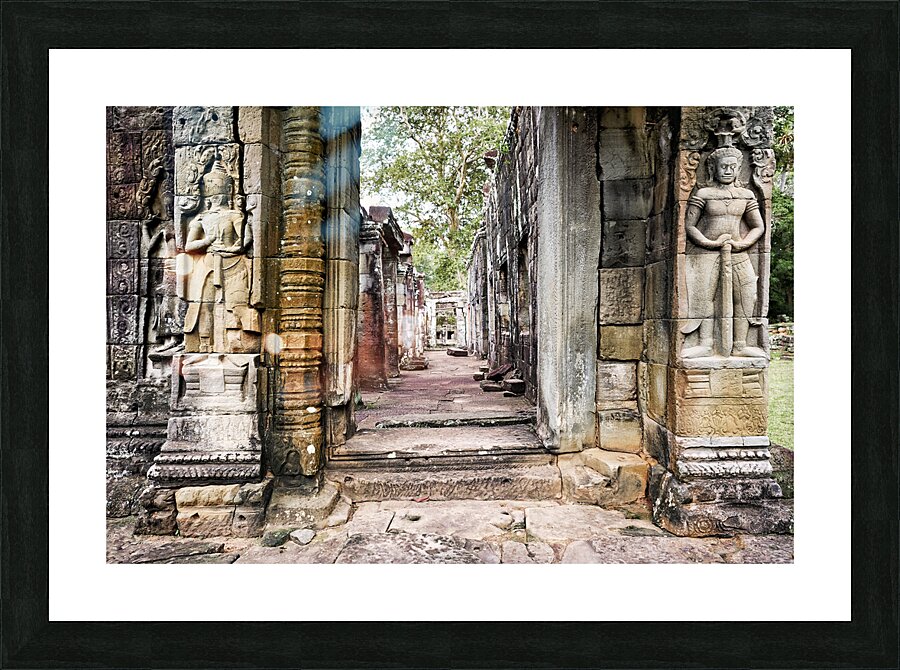 Statues at the entrance of the jungle temples of Ta Prohm. Siem Reap. Cambodia Picture Frame print