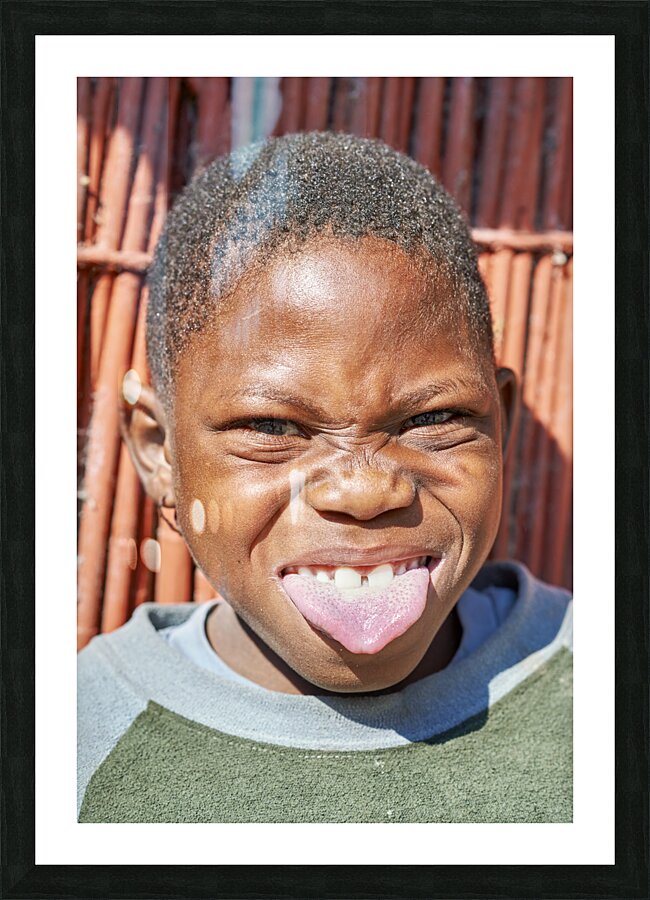 Namibia. Portrait of a joyful child in Kavango Region Picture Frame print