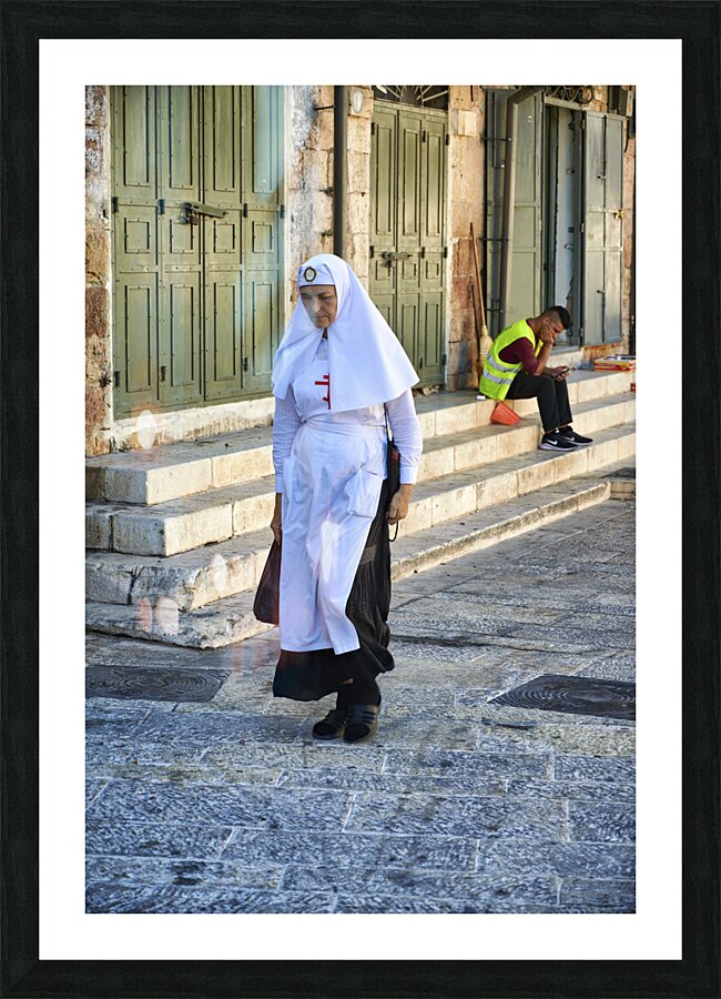 Jerusalem Israel. A nun in the streets of the old city Picture Frame print