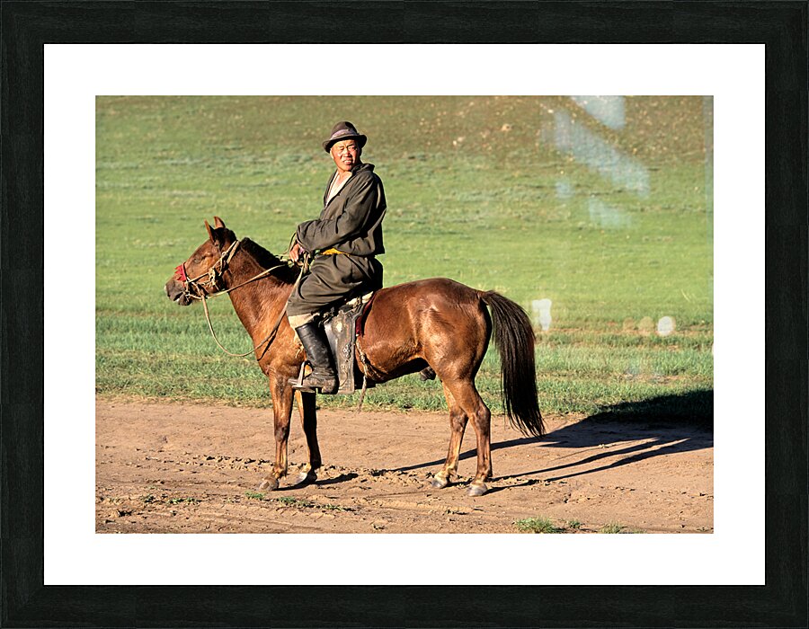 Mongolia. A sheperd riding his horse. Picture Frame print
