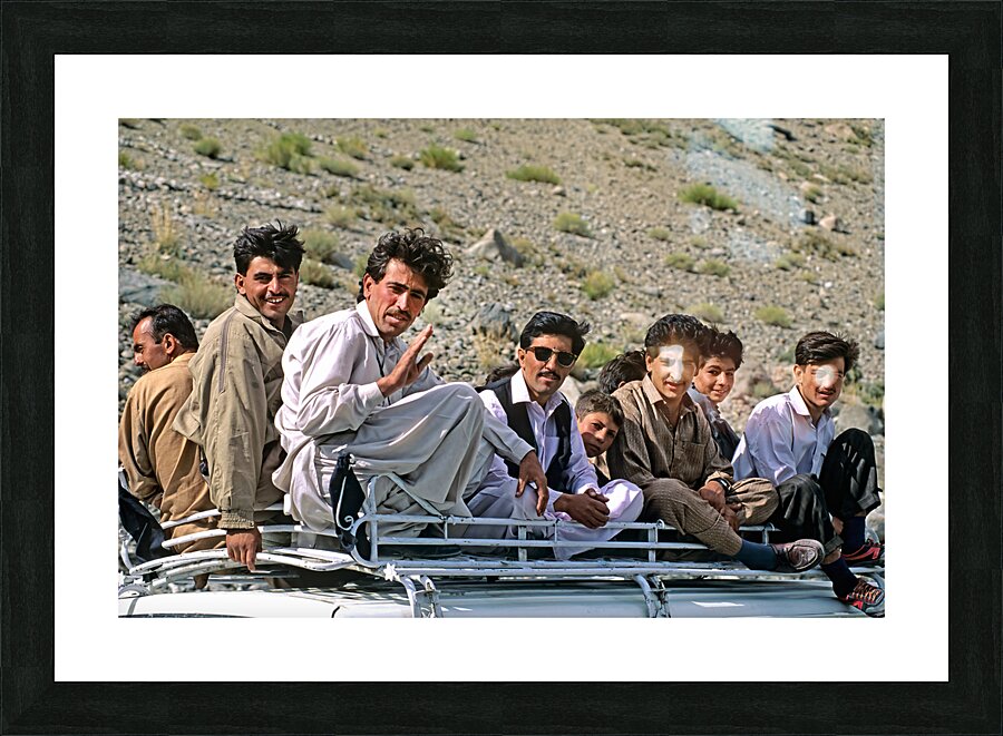 Pakistan. People travelling on the roof of a van Picture Frame print