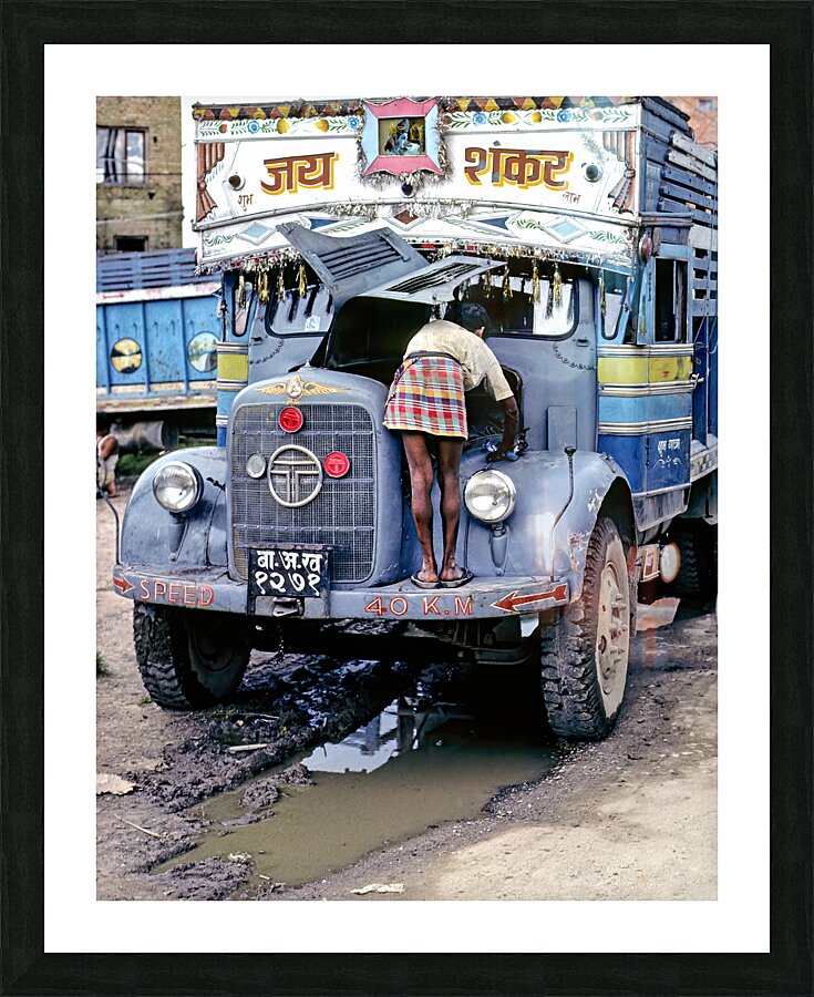 Nepal. Kathmandu. Repairing a truck Picture Frame print