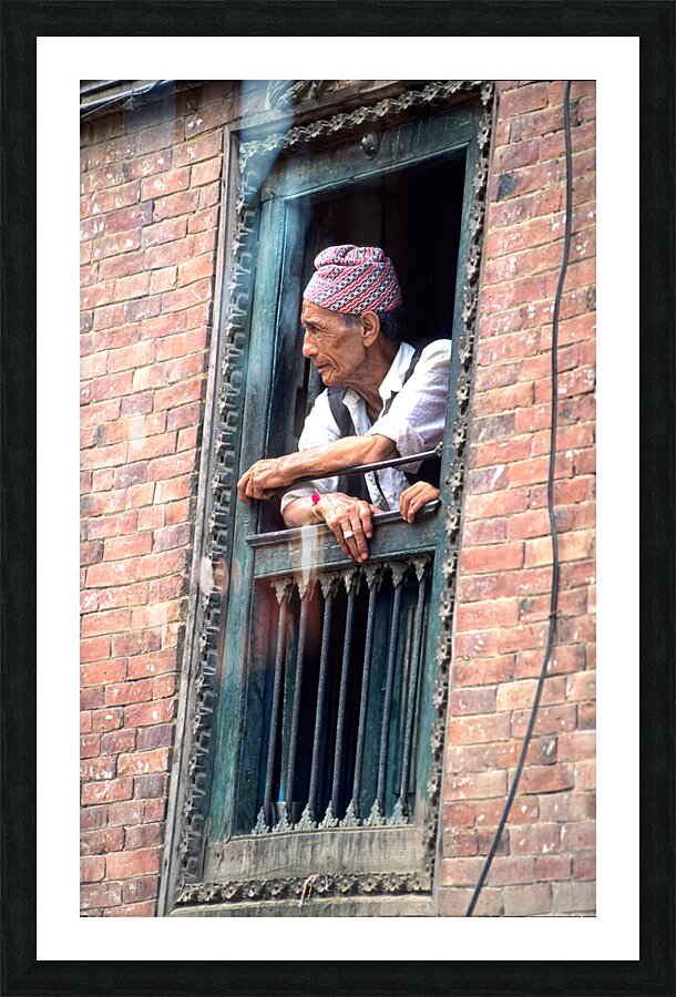 Nepal. Kathmandu. Man at a window Picture Frame print