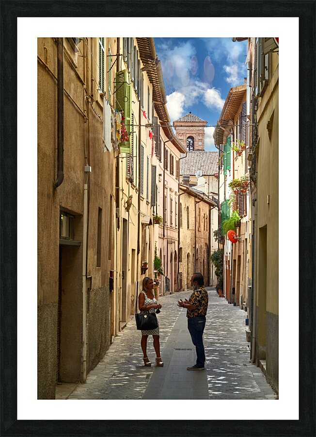 Foligno Umbria Italy. Talking in the alleys of the old town Picture Frame print