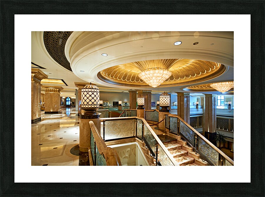 Opulent hotel lobby with grand staircase and golden chandeliers. Picture Frame print