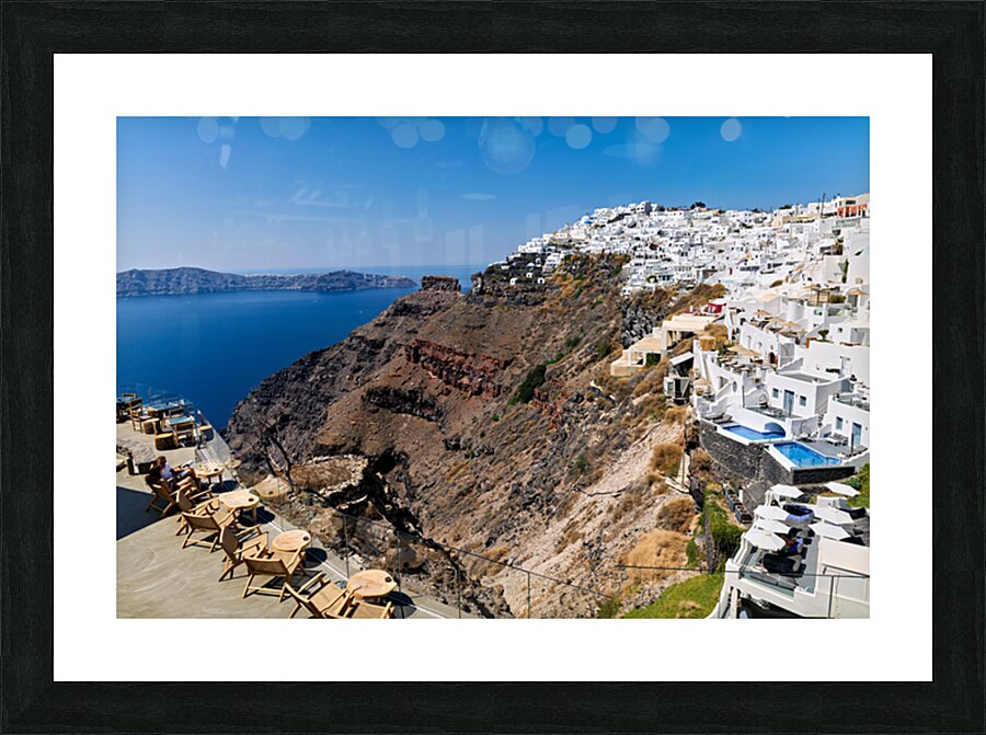 Santorinis white cliffside village and caldera view. Picture Frame print