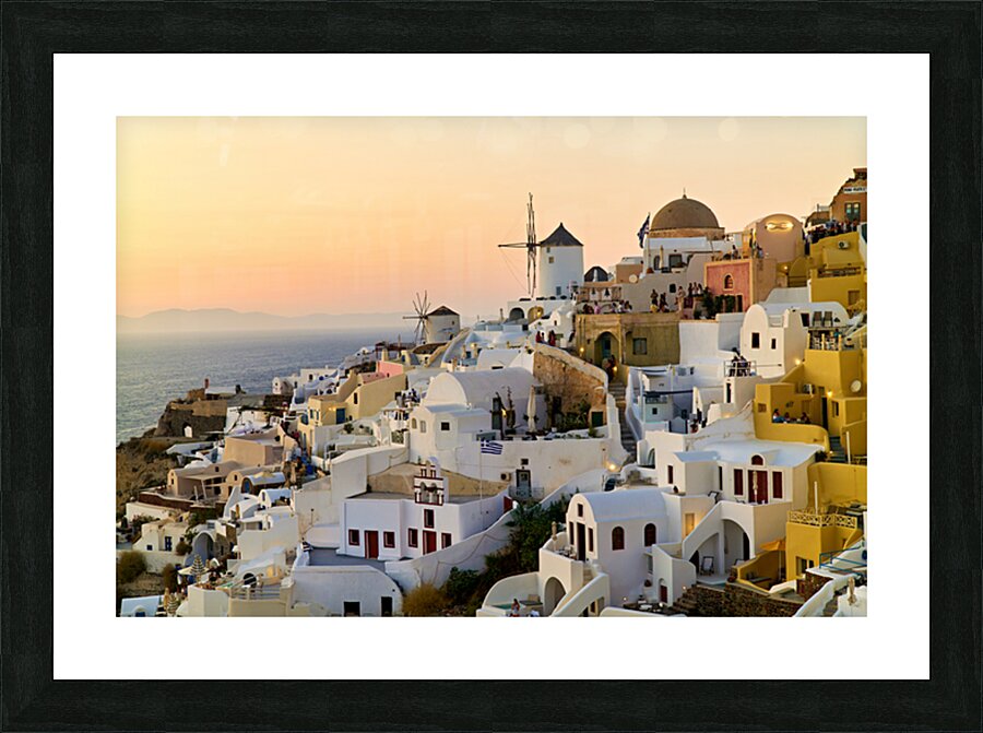 Whitewashed Santorini village and windmills at sunset over the s Picture Frame print