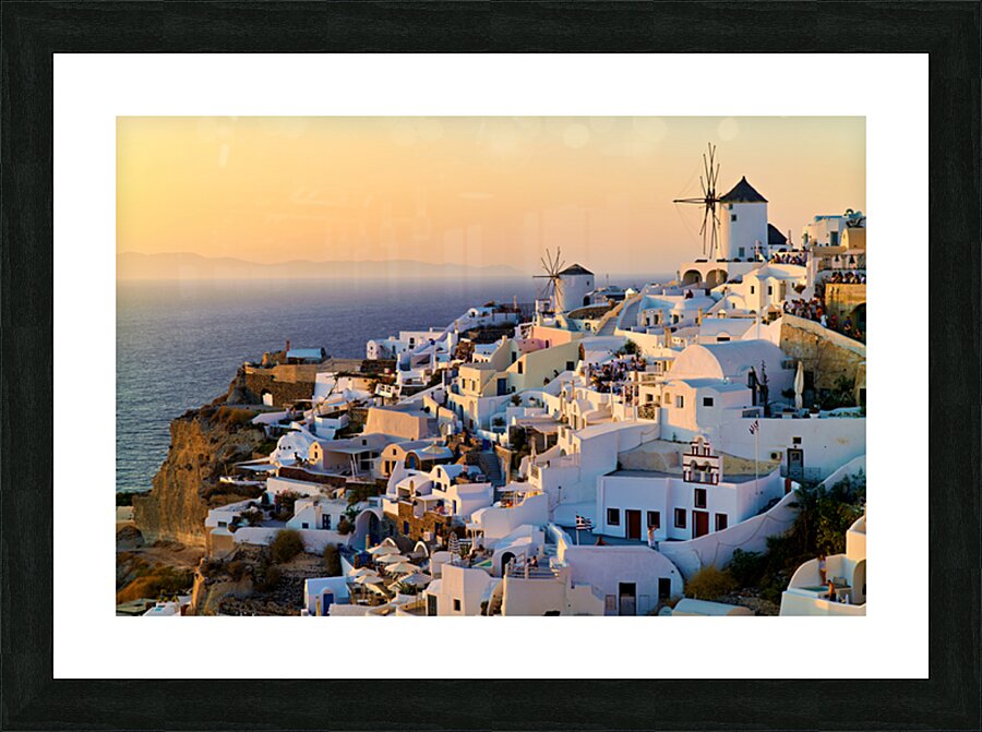 Santorini village at sunset with windmills overlooking the Aegea Picture Frame print