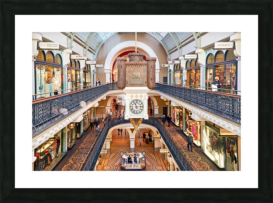 Elegant Victorian shopping arcade with clock tower and shoppers. Picture Frame print