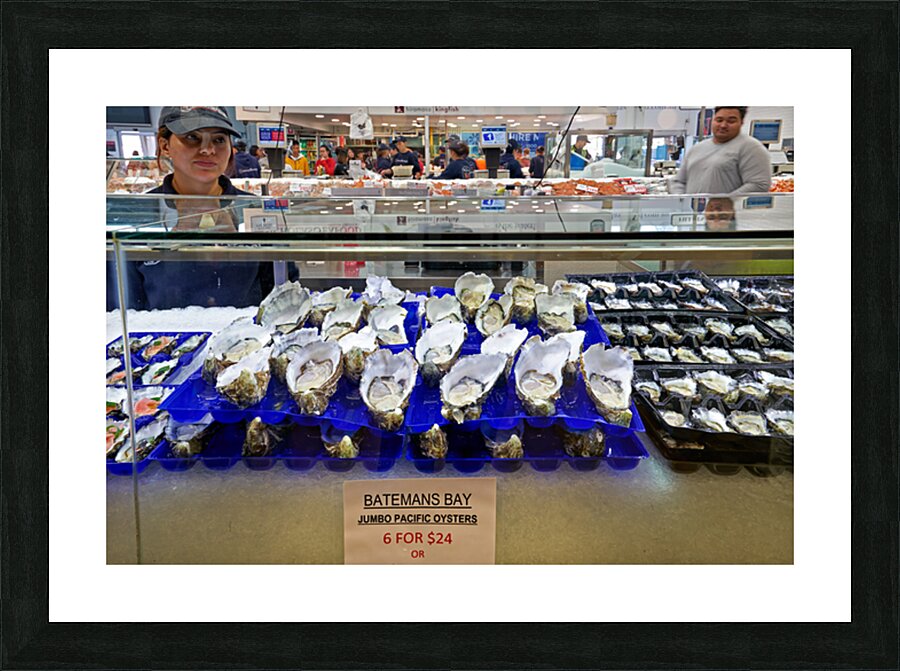 Fresh oysters on display at a seafood market. Picture Frame print