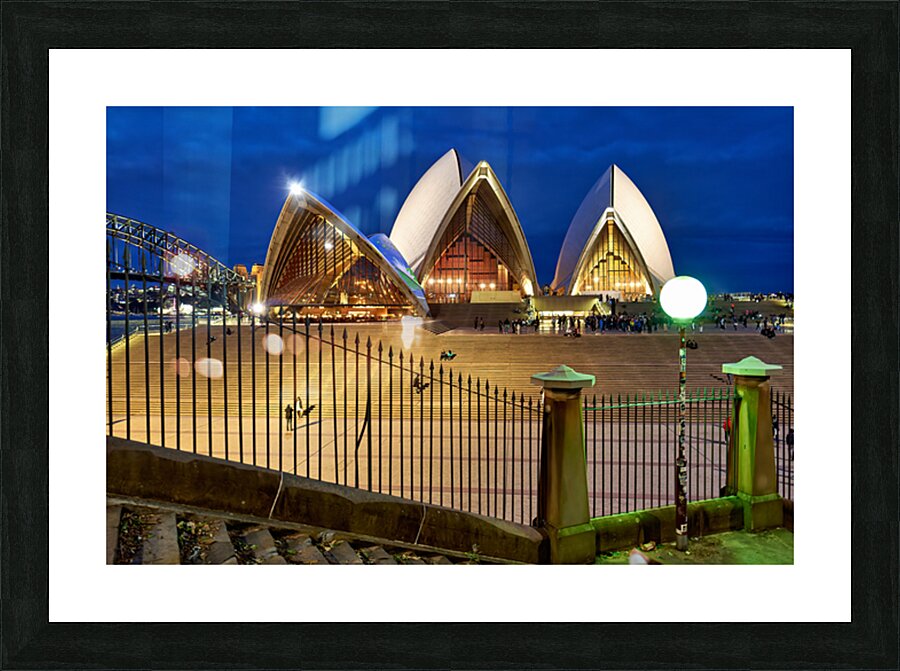 Sydney Opera House illuminated at dusk with crowds on steps. Picture Frame print
