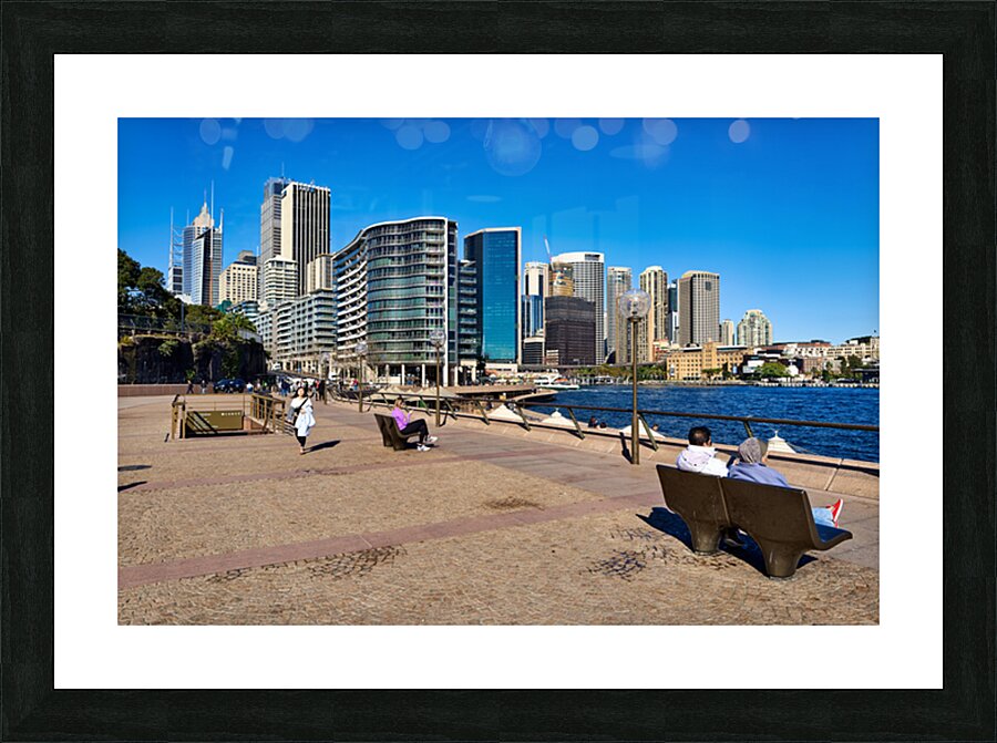 Sydney Harbour skyline with people enjoying the waterfront prome Picture Frame print