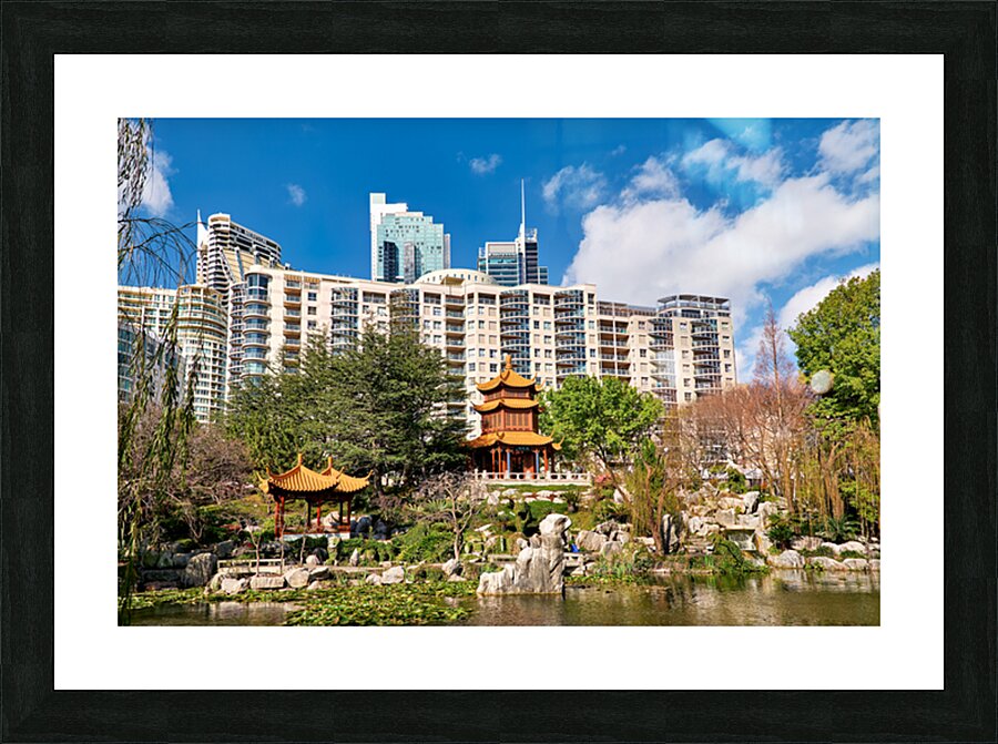 Chinese garden with pagodas and modern buildings Picture Frame print