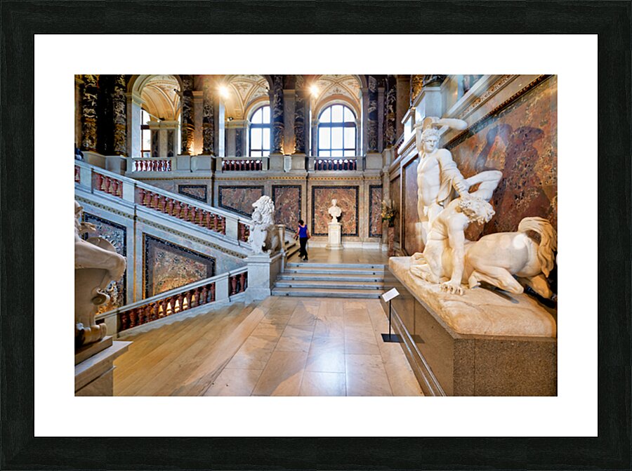 Ornate museum hall with statues grand staircase and visitor. Picture Frame print