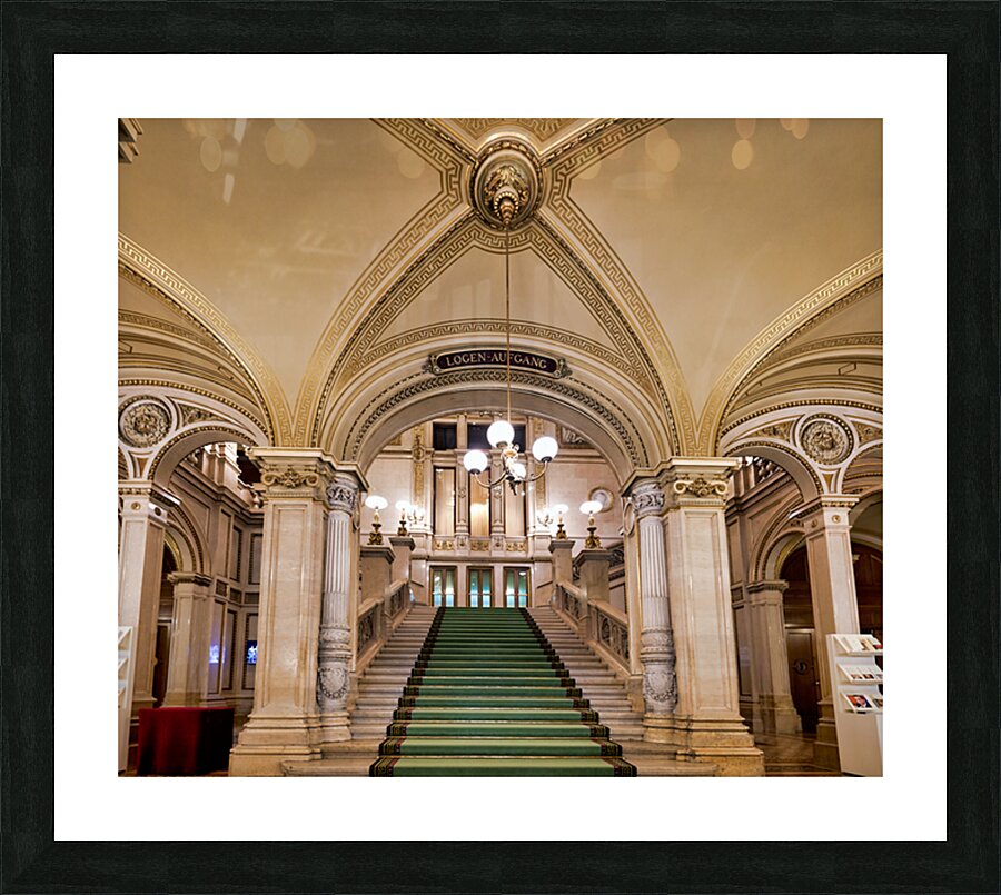 Majestic staircase with green carpet in an ornate hall. Picture Frame print