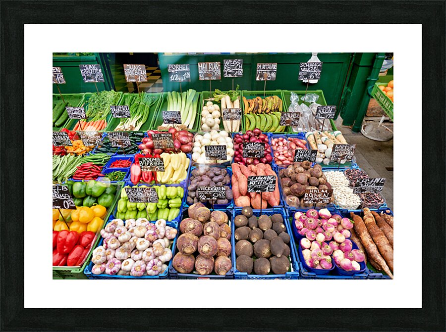 Colorful fresh vegetables and fruits displayed at a market stall Picture Frame print