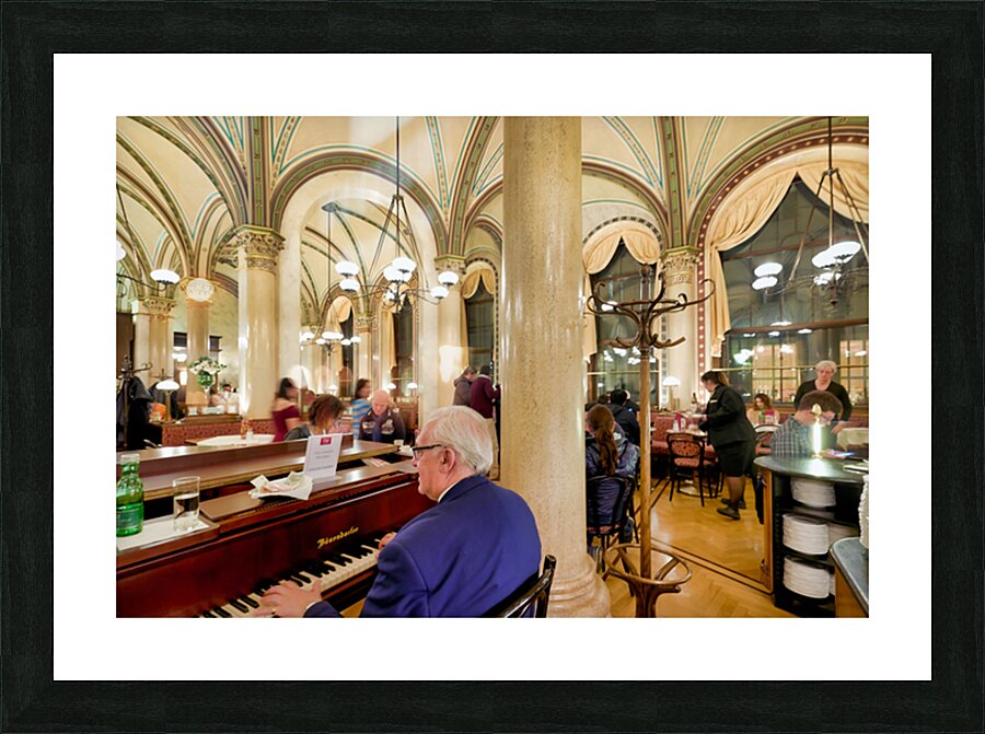 Man playing piano in an ornate bustling cafe. Picture Frame print