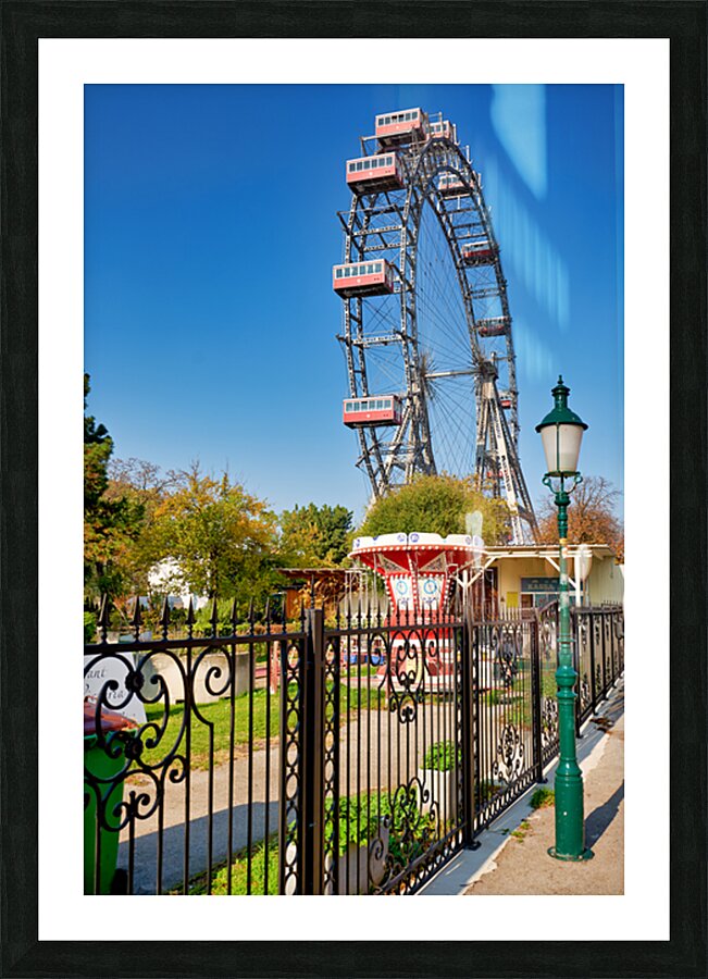 Prater Ferris wheel and carousel under a clear blue sky. Picture Frame print
