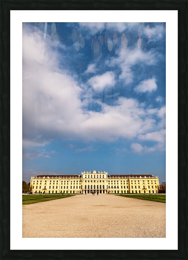 Schönbrunn Palace and gardens under a beautiful cloudy sky. Picture Frame print