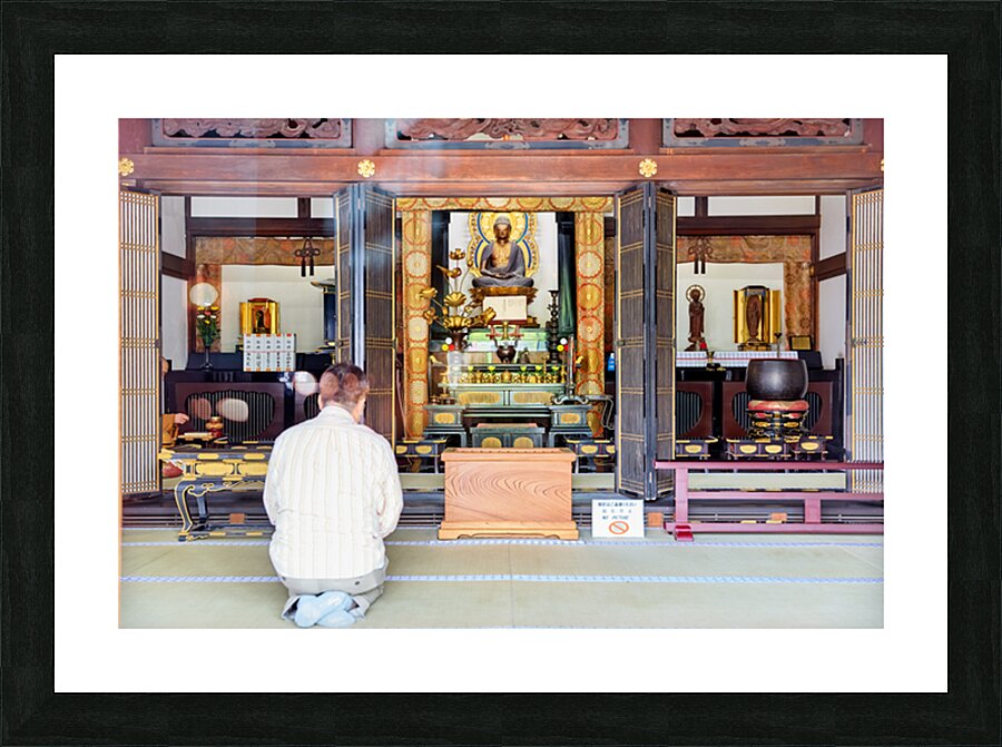 Man prays at Senso ji temple in Asakusa Tokyo Japan Picture Frame print
