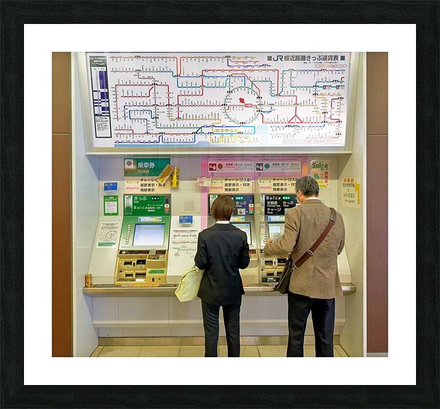 Buying tickets at a metro station in Tokyo Japan during the day Picture Frame print