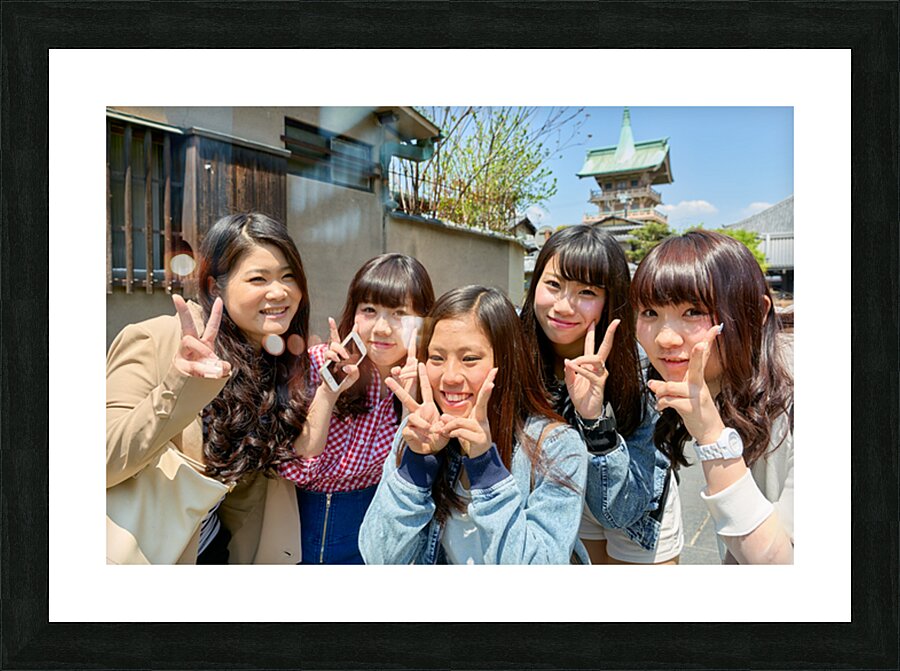 Young girls smiling in Kyoto while enjoying the day together Picture Frame print