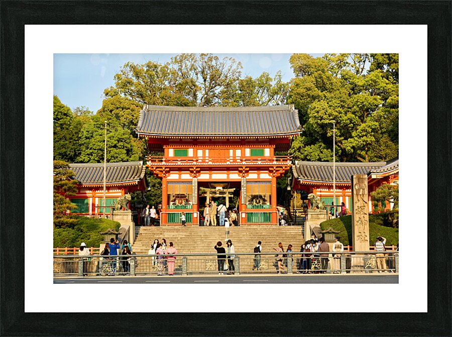Kyoto Yasaka shrine temple with visitors and trees in background Picture Frame print